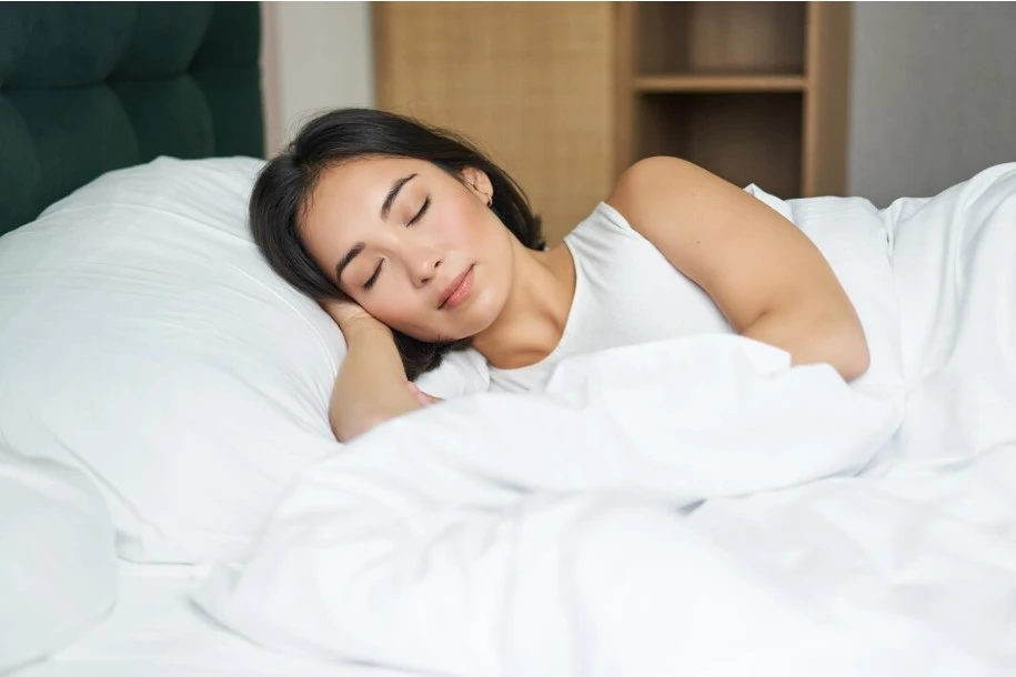 10 Best Strategies for Weight Loss Maintenance weight loss maintenance- a woman sleeping in bed